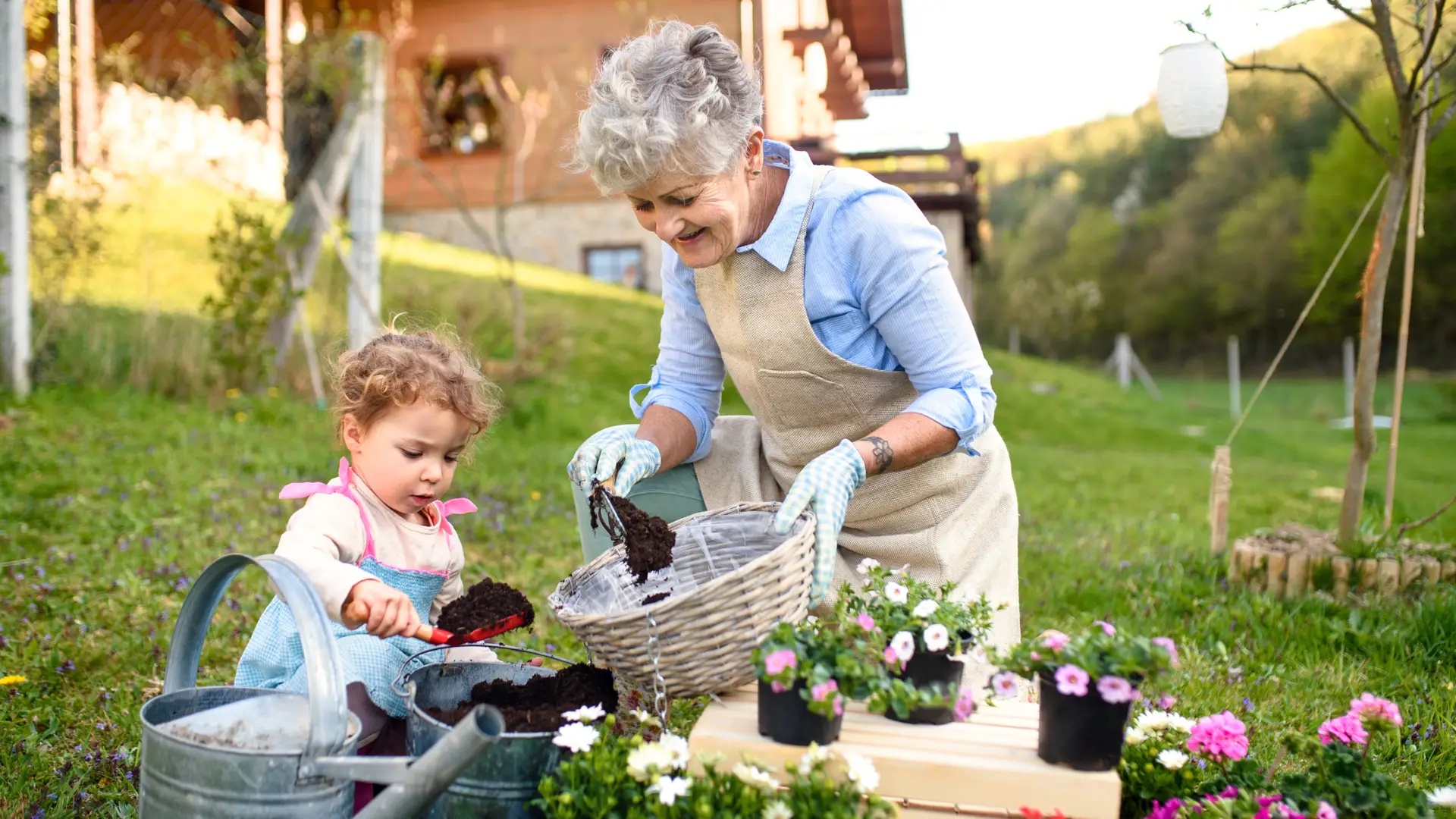 Grandmother gardening with her granddaughter, enjoying life without nerve pain
